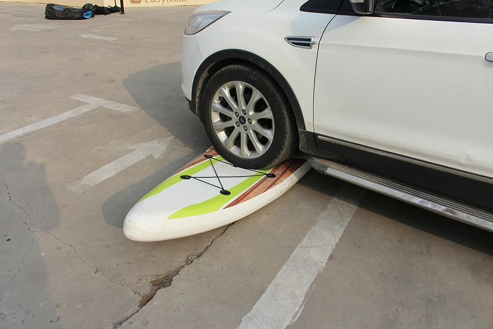 Car driving over propeller blades video Car driving over propeller blades video